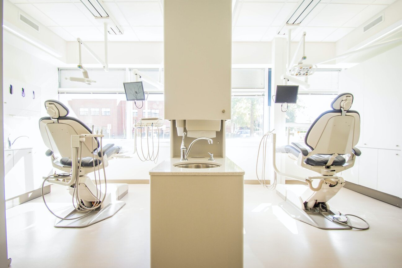 dentist office medical chairs facing sunlit windows